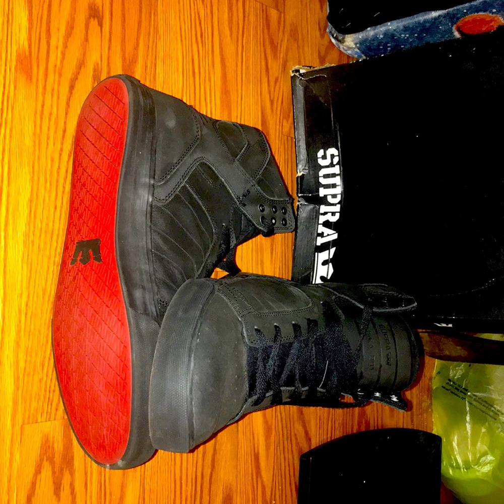 Supra sky tops (with the red bottoms)